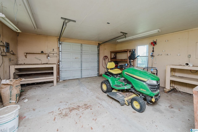 garage with a workshop area