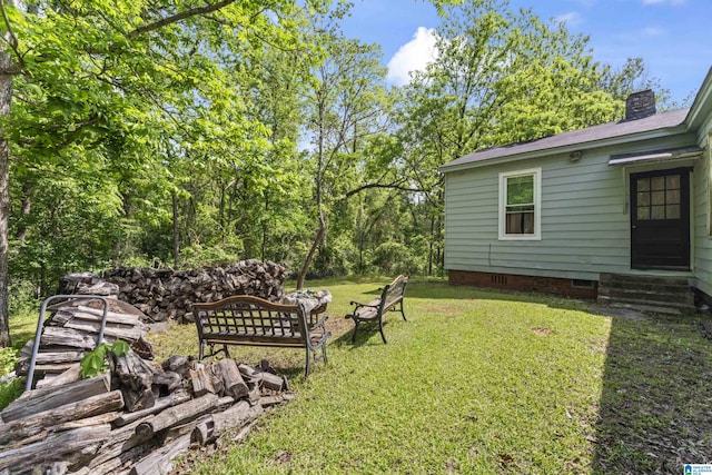 view of yard featuring entry steps