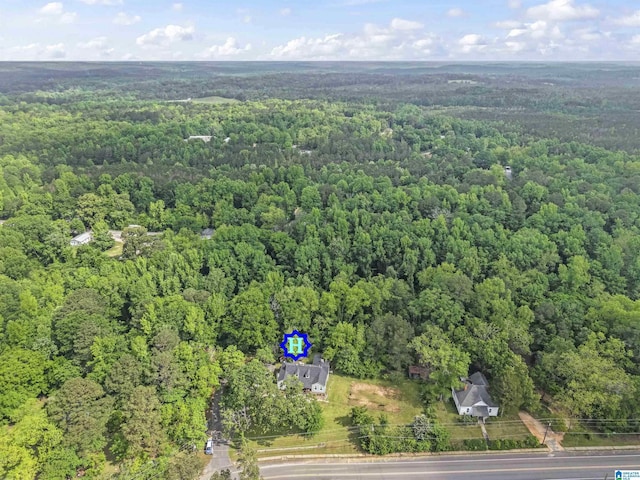 aerial view featuring a forest view