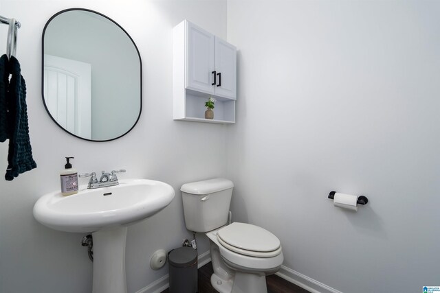 8659 Clarke Ln, Leeds, AL 35094 - bathroom featuring toilet and baseboards