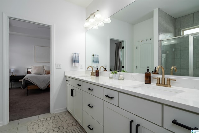 8659 Clarke Ln, Leeds, AL 35094 - ensuite bathroom with a sink, tile patterned flooring, a stall shower, and double vanity