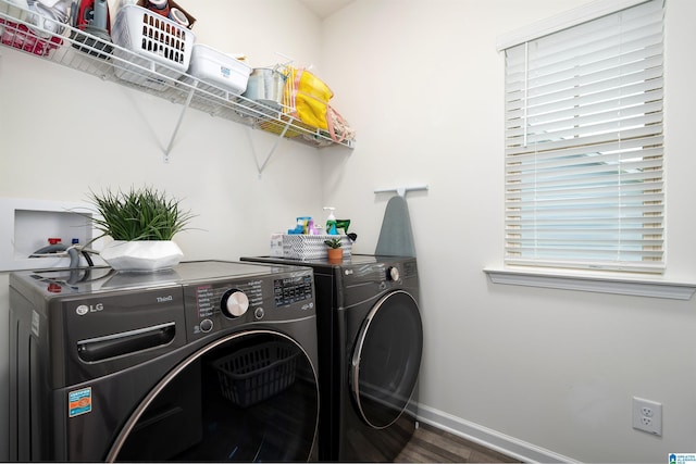 8659 Clarke Ln, Leeds, AL 35094 - laundry area with laundry area, baseboards, washing machine and dryer, and wood finished floors
