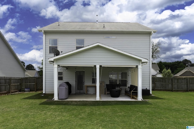 8659 Clarke Ln, Leeds, AL 35094 - back of house featuring a lawn, a fenced backyard, outdoor lounge area, and a patio area