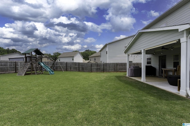 8659 Clarke Ln, Leeds, AL 35094 - view of yard with a patio, ceiling fan, a fenced backyard, and a playground