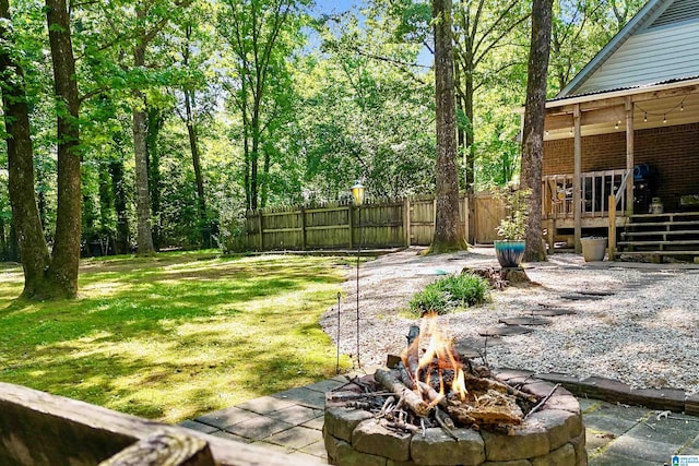 6522 Quail Run Dr, Pelham, AL 35124 - view of yard with an outdoor fire pit and a wooden deck