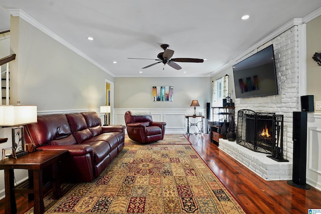 6522 Quail Run Dr, Pelham, AL 35124 - living area featuring a ceiling fan, a fireplace, recessed lighting, wood finished floors, and ornamental molding