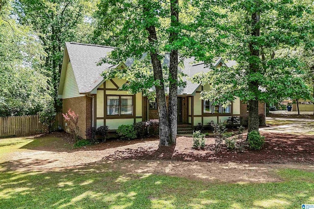 6522 Quail Run Dr, Pelham, AL 35124 - tudor home featuring roof with shingles and stucco siding