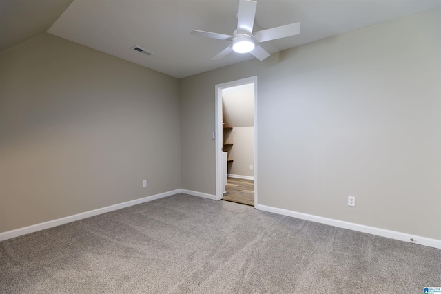5251 Vintage Way, Mccalla, AL 35111 - unfurnished room with visible vents, carpet floors, lofted ceiling, baseboards, and a ceiling fan