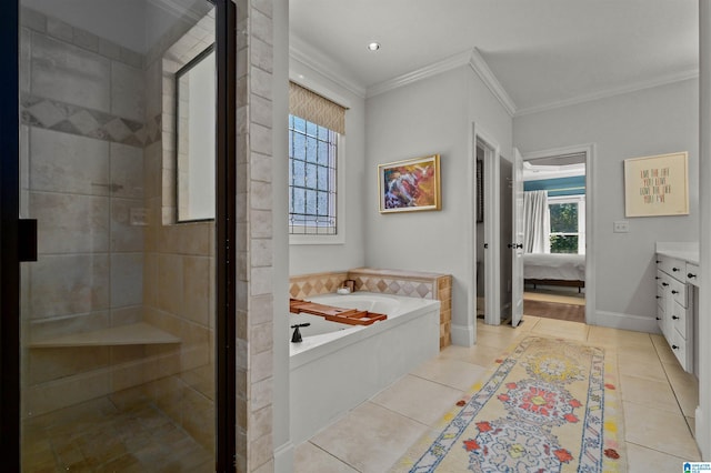 bathroom featuring ornamental molding, a wealth of natural light, a bath, and tile patterned floors