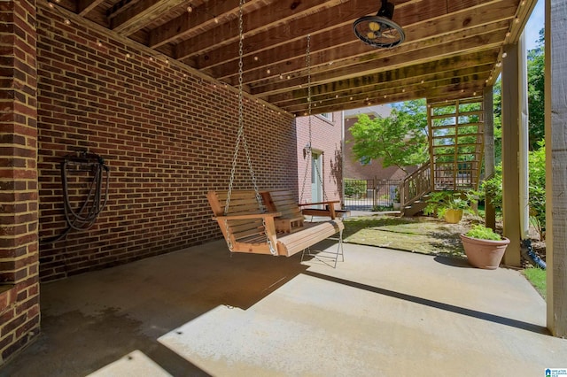 view of patio with stairway