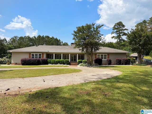 299 Brecon Cir, Talladega, AL 35160 - ranch-style home with crawl space, a chimney, and a front yard