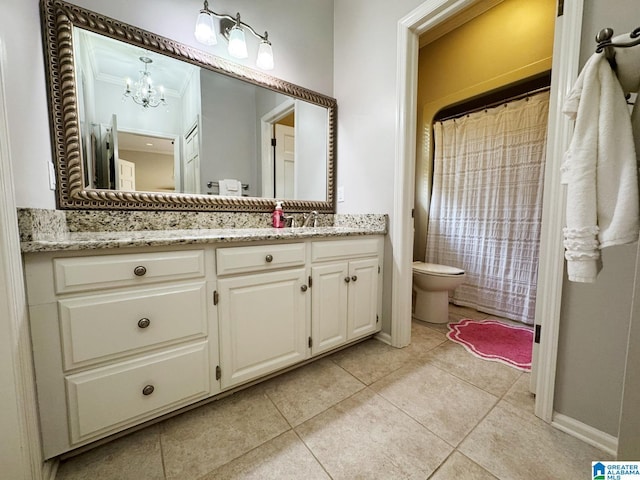 299 Brecon Cir, Talladega, AL 35160 - full bath with tile patterned flooring, crown molding, vanity, toilet, and a notable chandelier