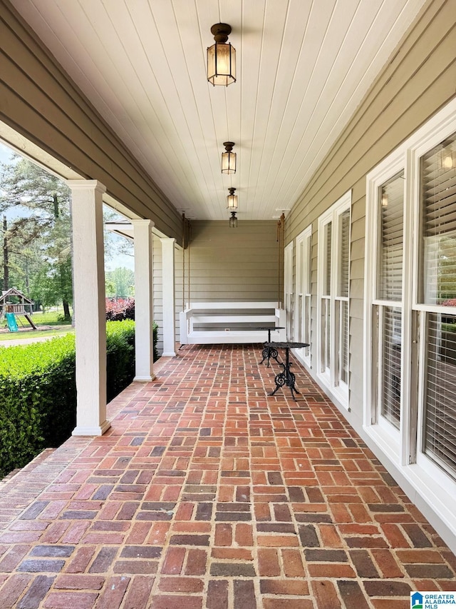 299 Brecon Cir, Talladega, AL 35160 - view of patio with a porch