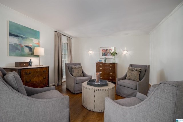 living room featuring crown molding and wood finished floors