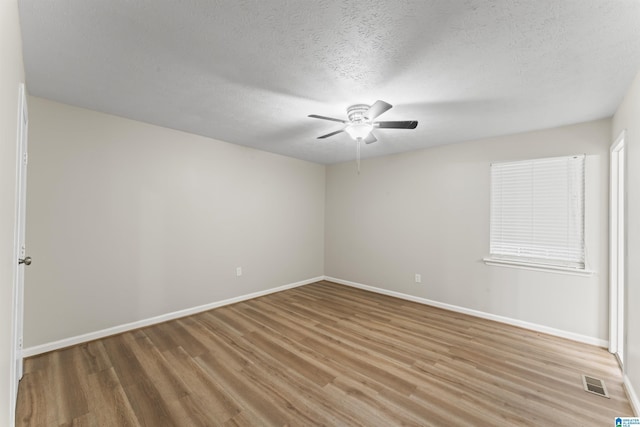 603 Danton Ln, Irondale, AL 35210 - unfurnished room with visible vents, a ceiling fan, baseboards, and light wood-type flooring