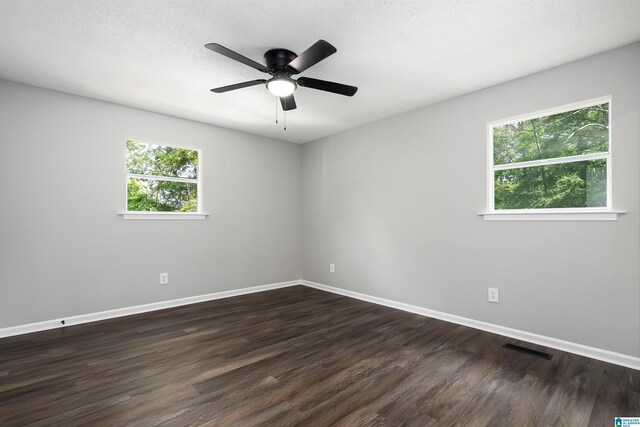 1006 Cannon Cir, Birmingham, AL 35235 - unfurnished room with baseboards, ceiling fan, dark wood finished floors, and visible vents