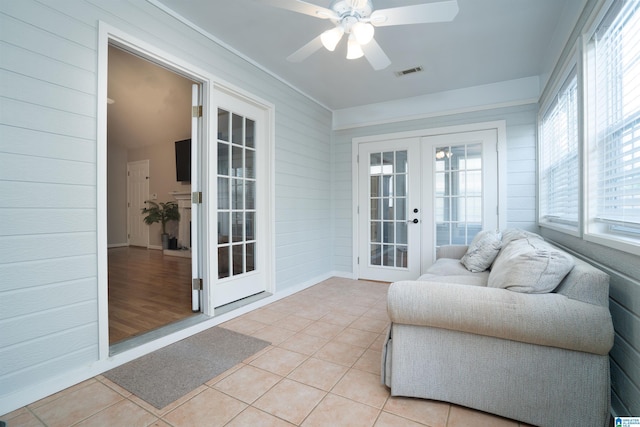 sunroom / solarium featuring french doors and visible vents