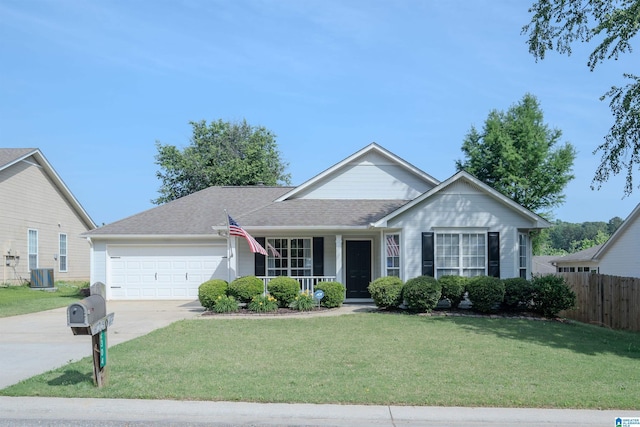 single story home featuring fence, a front yard, an attached garage, central air condition unit, and driveway