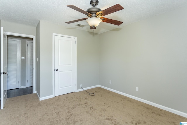708 Patton Chapel Way Unit 708, Hoover, AL 35226 - unfurnished bedroom featuring visible vents, a ceiling fan, baseboards, and carpet floors