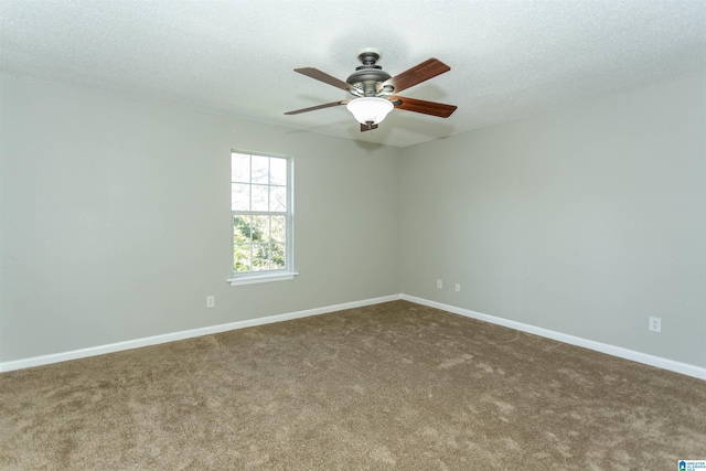 708 Patton Chapel Way Unit 708, Hoover, AL 35226 - spare room featuring dark colored carpet, a textured ceiling, baseboards, and ceiling fan