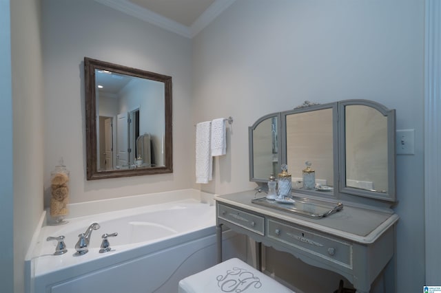 bathroom with crown molding, a bath, and vanity