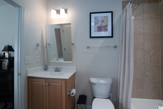 full bath with toilet and vanity