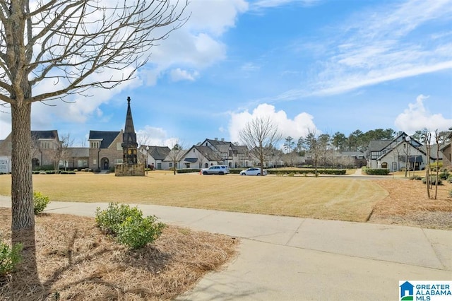 view of yard featuring a residential view