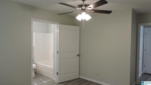 316 Creek Run Cir, Calera, AL 35040 - unfurnished bedroom with light wood-style flooring, a ceiling fan, and baseboards