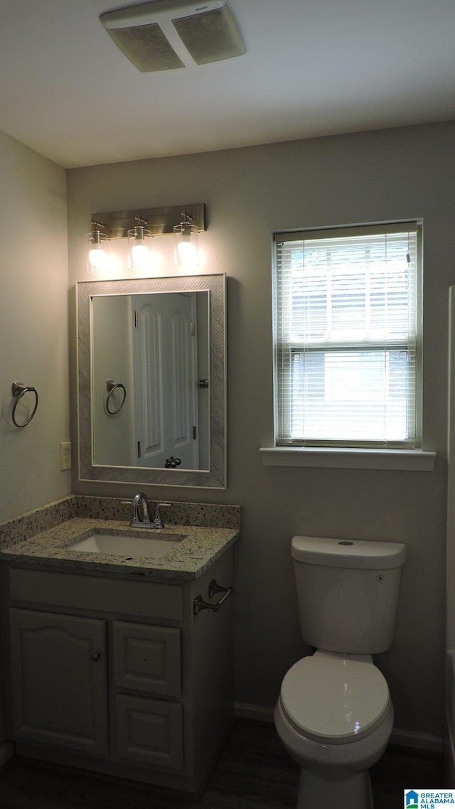 316 Creek Run Cir, Calera, AL 35040 - bathroom with toilet, vanity, and baseboards