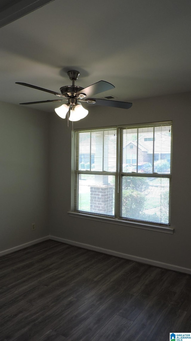 316 Creek Run Cir, Calera, AL 35040 - empty room with a ceiling fan, dark wood-style floors, and baseboards