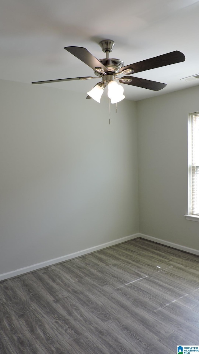 316 Creek Run Cir, Calera, AL 35040 - empty room featuring ceiling fan, dark wood-type flooring, and baseboards