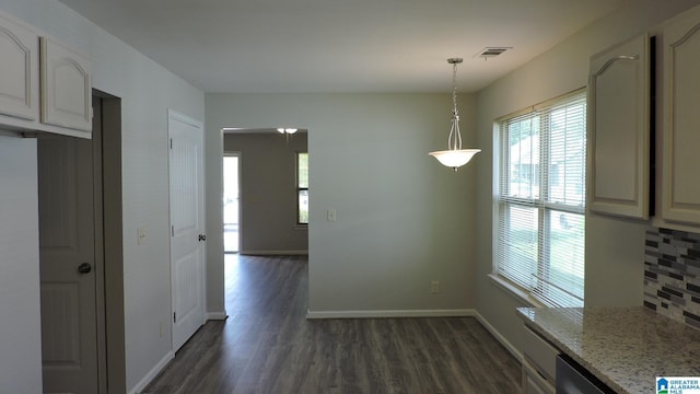 316 Creek Run Cir, Calera, AL 35040 - unfurnished dining area featuring dark wood finished floors and baseboards