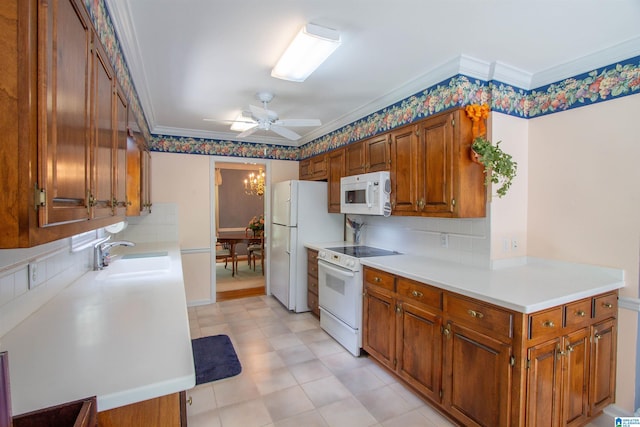 836 Tulip Poplar Dr, Hoover, AL 35244 - kitchen with white appliances, a sink, a ceiling fan, backsplash, and brown cabinets