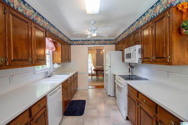 836 Tulip Poplar Dr, Hoover, AL 35244 - kitchen with white appliances, a sink, a ceiling fan, tasteful backsplash, and crown molding