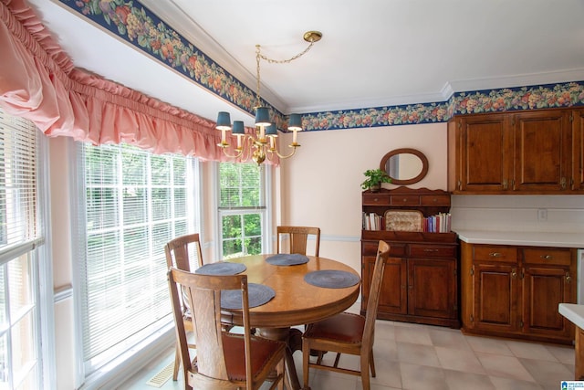 836 Tulip Poplar Dr, Hoover, AL 35244 - dining room featuring a chandelier and ornamental molding