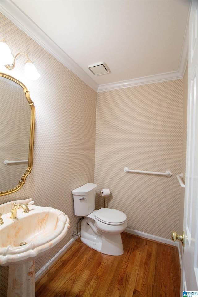 836 Tulip Poplar Dr, Hoover, AL 35244 - bathroom featuring ornamental molding, wood finished floors, toilet, wallpapered walls, and a sink