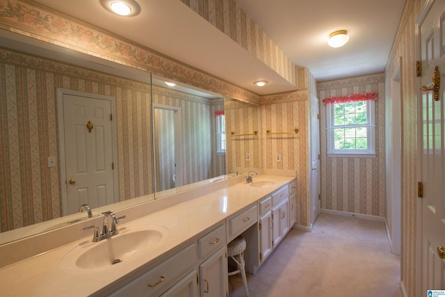 836 Tulip Poplar Dr, Hoover, AL 35244 - full bathroom with wallpapered walls, double vanity, and baseboards