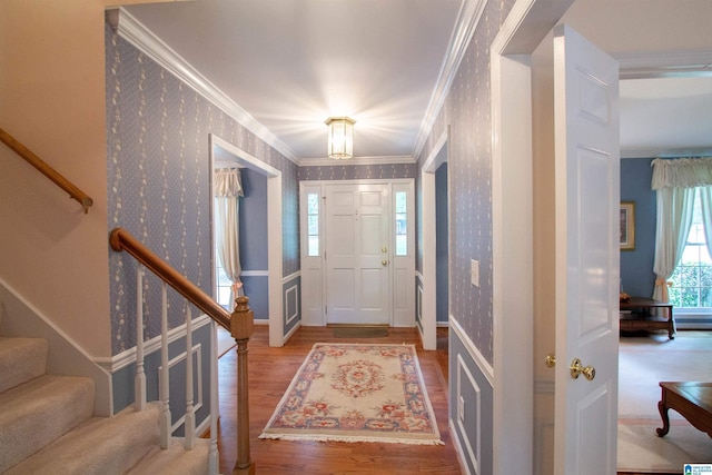 836 Tulip Poplar Dr, Hoover, AL 35244 - entrance foyer with stairway, wallpapered walls, crown molding, wood finished floors, and baseboards