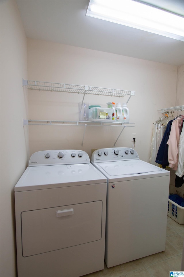 836 Tulip Poplar Dr, Hoover, AL 35244 - laundry room featuring washing machine and clothes dryer and light tile patterned floors