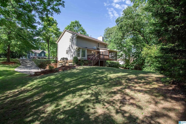 836 Tulip Poplar Dr, Hoover, AL 35244 - rear view of house with stairs, a chimney, a lawn, and a deck