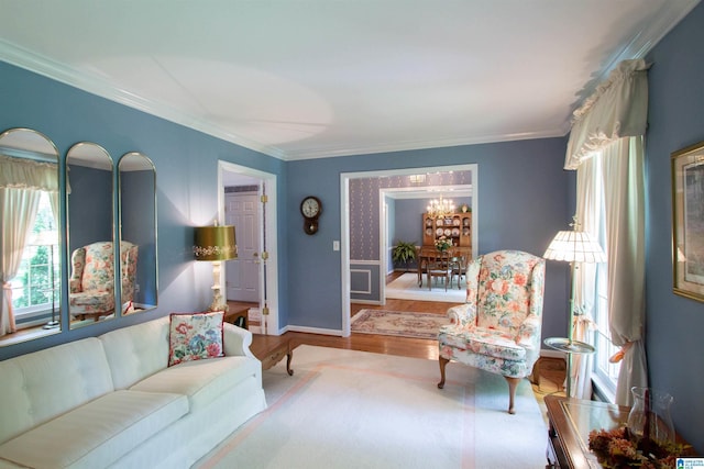 836 Tulip Poplar Dr, Hoover, AL 35244 - living room with wood finished floors, crown molding, and a chandelier
