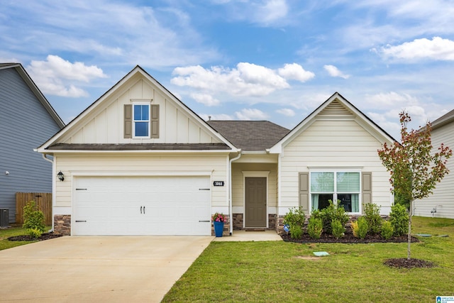 view of front facade featuring board and batten siding, stone siding, concrete driveway, and a front yard