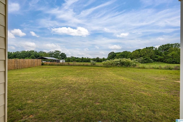 view of yard with fence