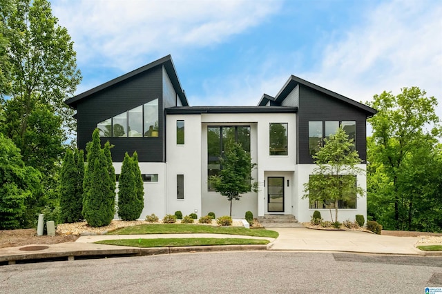 modern home featuring stucco siding