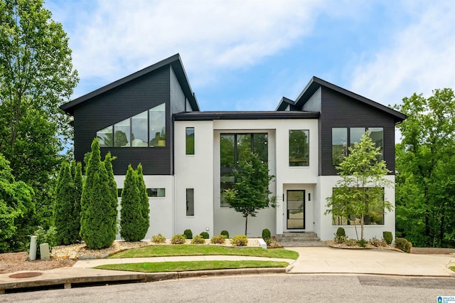 contemporary house featuring stucco siding