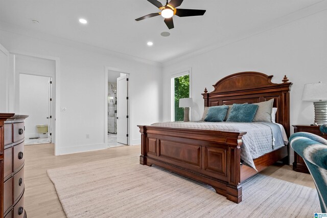 bedroom with crown molding, light wood finished floors, connected bathroom, baseboards, and recessed lighting