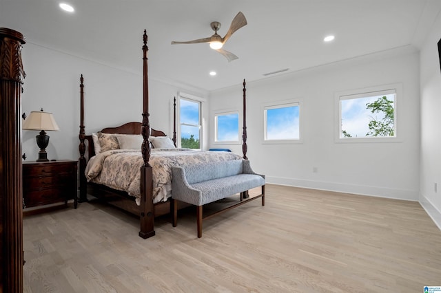 bedroom with light wood-type flooring, baseboards, recessed lighting, and a ceiling fan