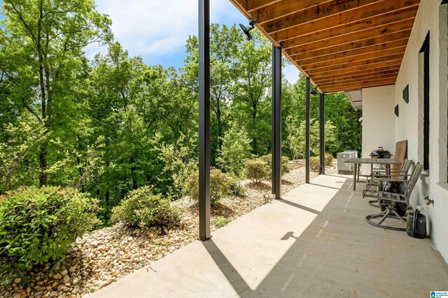 view of patio with central AC unit