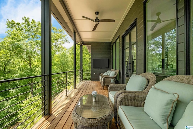 balcony featuring ceiling fan