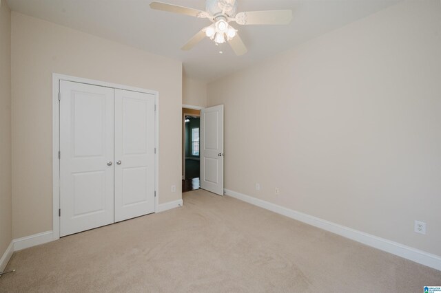 124 Blackstone Ct, Chelsea, AL 35043 - unfurnished bedroom featuring baseboards, a ceiling fan, a closet, and light colored carpet